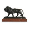 Lion en bronze signé Barye sur son socle en marbre